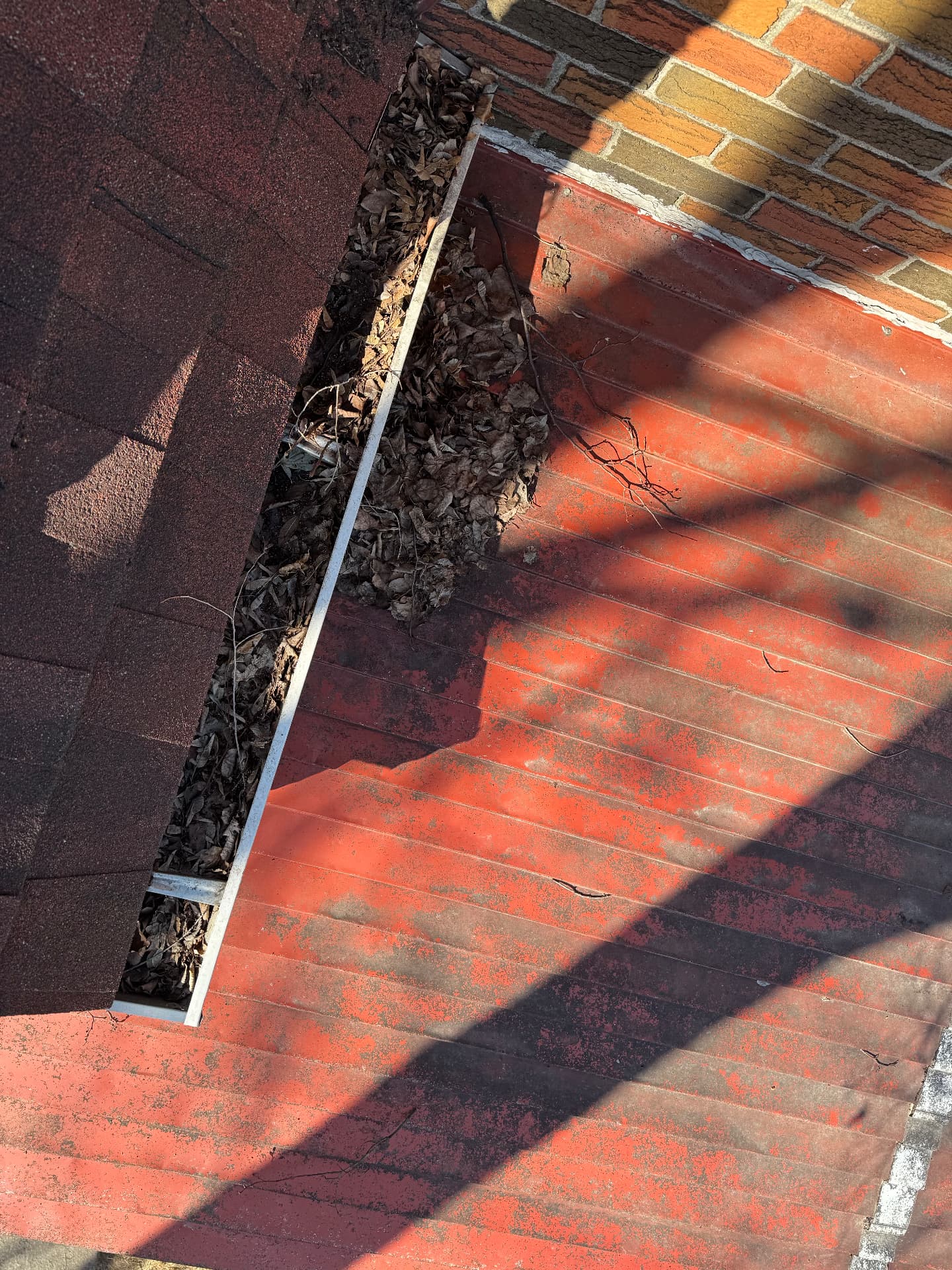 Eavestrough Cleaning before in Toronto